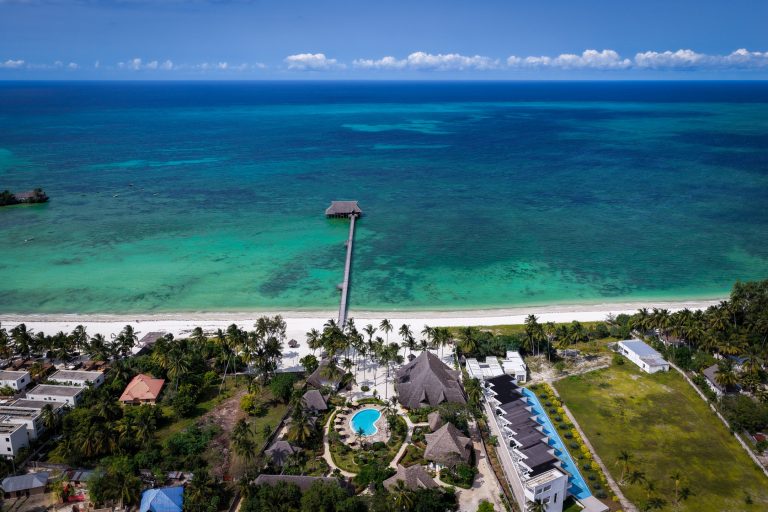 Turquoise lagoon and the resort jetty at Pongwe Bay Resort from above