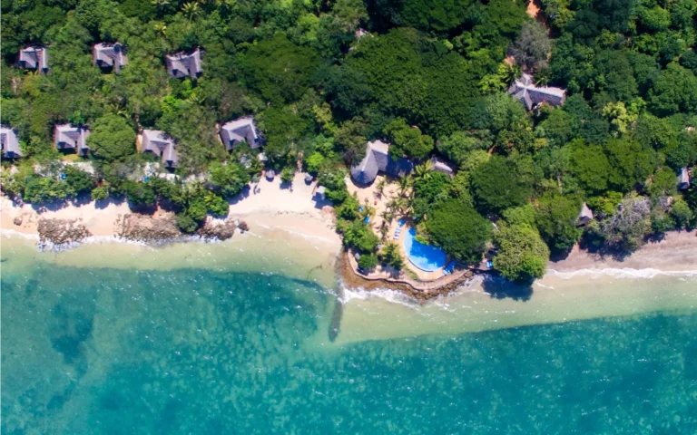 Coastline and coral bay at Fumba Beach Lodge seen from above