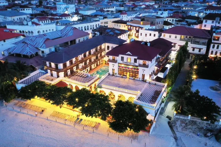 Aerial view of Tembo House Hotel on the Stone Town waterfront at dusk
