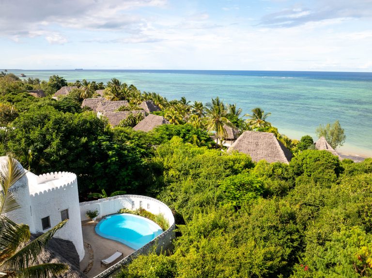 Aerial view over the Monsoon Villa and gardens to the reef at Shooting Star Boutique Hotel