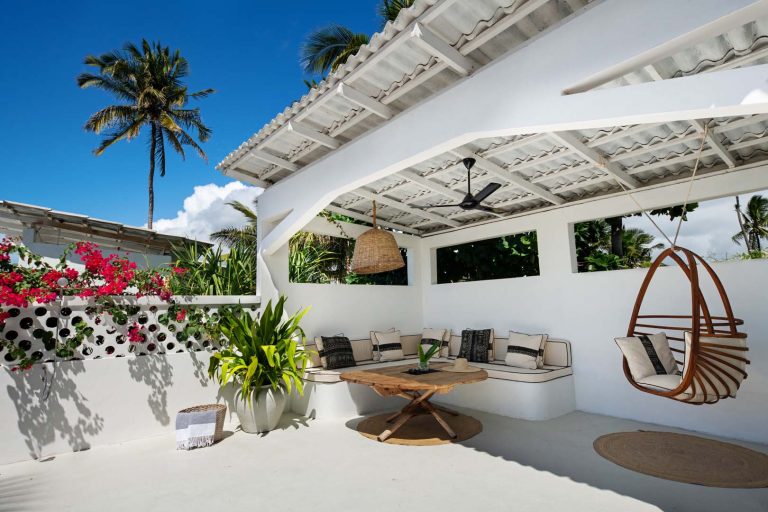 Rooftop lounge with hanging chair at a private villa, Upendo Beach