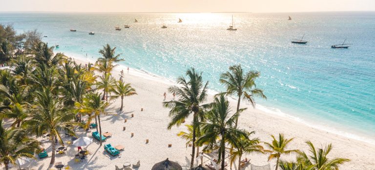 Kendwa beach in front of Zuri Zanzibar with palms and turquoise water