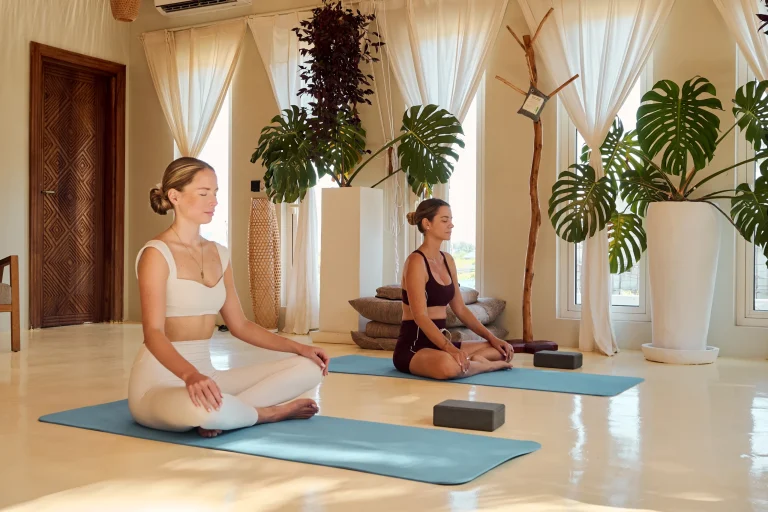 Yoga session in the bright wellness studio at Samawa Living